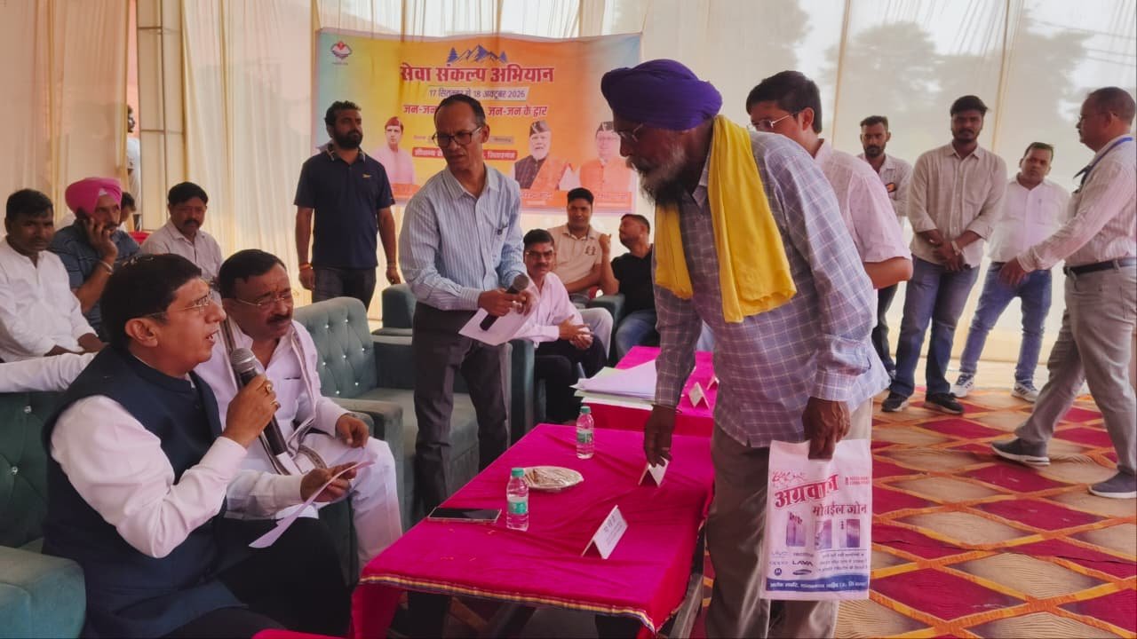 सेवा संकल्प अभियान के तहत सरकार जन-जन के द्वार,सितारगंज बहुउद्देशीय शिविर में बांटे गए चेक व उपकरण,अनुपस्थित अफसरों का स्पष्टीकरण तलब